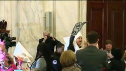Protesters in KKK garb cause ruckus at U.S. Senate hearings News Clip