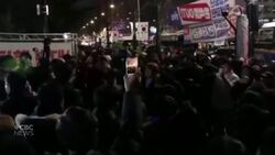 Opposition supporters gather outside South Korea's parliament after martial law declaration News Clip