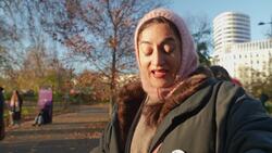 Ai Weiwei signs white paper at Hyde Park News Clip