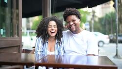 Happy young couple embracing in a bar - Portrait Stock Footage