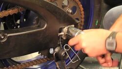 How to Adjust a Motorcycle Chain Instructional Video
