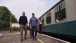 Rishi Sunak arrives by train at Bury Station and visits Burrs Activity Centre News Clip
