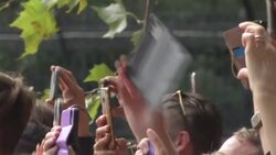 UK: Crowds of people gather to line streets of London for the state funeral of Her Majesty Queen Elizabeth News Clip