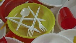 Rotating new colorful plastic disposable tableware Stock Footage