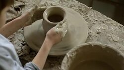 Little Boy Making Pottery on Spinning Wheel Stock Footage