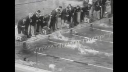 US takes the gold in men's back stroke and high platform diving and a French father jumps into pool fully clothed to hug his winner son at the 1952 Summer Olympics in Helsinki News Clip