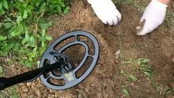 Treasure Hunters Using Metal Detector and Gloves Stock Footage