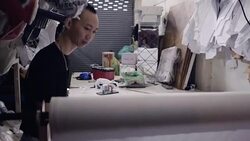 Clothing Factory : His work desk. Stock Footage