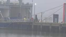Freight lorries loading and unloading onto ferry News Clip
