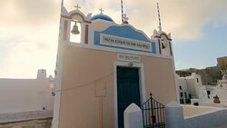 Traditional blue domed greek Orthodox church in Oia, Santorini Greece Stock Footage