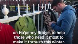 Warm for Winter charity hangs coats on Ha'penny Bridge News Clip