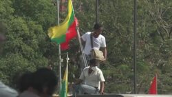 CLEAN : Myanmar coup: Army supporters ride through the streets of Yangon News Clip