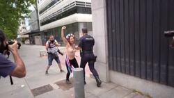 CLEAN : Femen activists protest outside Spain's US embassy after abortion ruling News Clip