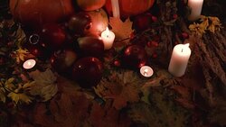 Harvest small and large pumpkins,red apples, yellow flowers Stock Footage