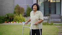 tired senior woman having heart problem after walking with walker at home Stock Footage