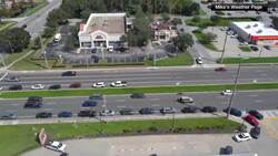 Drone video shows long gas lines at a Thorntons in Oldsmar, Florida Saturday morning News Clip