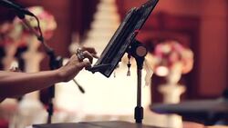 Musician use digital tablet in party. Stock Footage