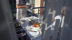 Family dinner on the balcony of the apartment Stock Footage