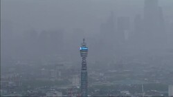 BT Tower during the Coronavirus epidemic with misty view of London News Clip