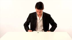 How to Do the Coin through a Table Trick Instructional Video