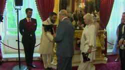 Prince Charles and Camilla don bedazzled animal masks in support of elephant conservation Instructional Video