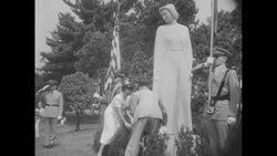 Pres. Eisenhower awards nurse Genevieve de Galard the Presidential Medal of Freedom during a ceremony in the White House Rose Garden News Clip