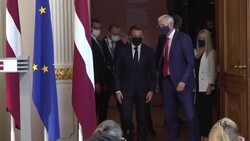 CLEAN : French and Latvian Presidents attend press conference and wreath laying ceremony at Monument of Liberty in Riga News Clip