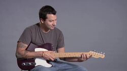 How to Play an E Minor Barre Chord on Guitar Instructional Video