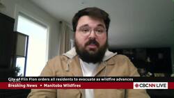 Residents of Flin Flon, Man., among thousands in province ordered to flee wildfire News Clip