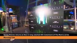 Keanu Reeves walks Toronto black carpet for Matrix sequel premiere News Clip