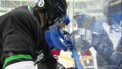 Introducing new Canadians to hockey News Clip