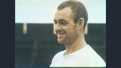 1960s: White car at construction site Stock Footage