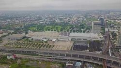 Aerial view of Bangkok International Trade and Exhibition Centre(BITEC) and traffic Stock Footage