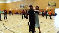 Couples, friends ballroom dance to celebrate love, friendship News Clip