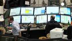 Shares slump as oil prices tumble to new lows News Clip