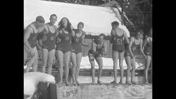 Swimmers jump into icy water News Clip