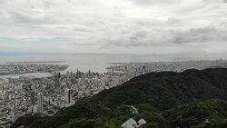 Right pan of cloudy Kyoto cityscape Stock Footage