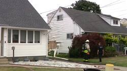 Officials: Car fire in Hicksville spreads to home, no injuries reported Instructional Video