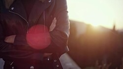 Beautiful girl posing in the sunlight. Sadness Stock Footage