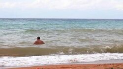 a man swimming in the sea Stock Footage