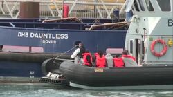 CLEAN : UK: migrants escorted by Border Force in the port of Dover News Clip