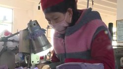 CLEAN : N. Korean workers sew face masks amid virus lockdown News Clip