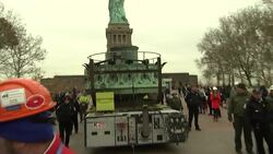 Lady Liberty's original torch moves to new home News Clip