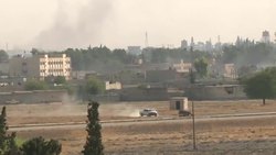 CLEAN : Smoke rises above Syrian town reportedly seized by Turkey and proxies News Clip