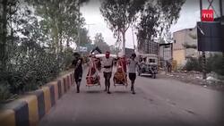 Kanwar Yatra: Female kawariya carries her grandparents in Kanwar for pilgrimage News Clip