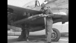 Korean War: loading bombs News Clip