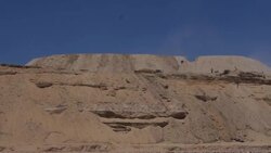 Tracking shots from moving boat of construction work taking place on sides of Suez Canal News Clip