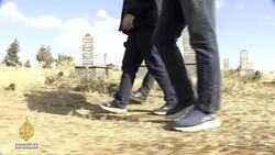 Syria: Thousands buried in Homs unmarked mass graves News Clip