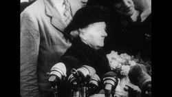 Atlantic Ocean, 1952: Captain Carlsen and his mate Dancy are welcomed by a large crowd and tell their stories at sea Stock Footage