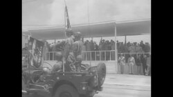 Syngman Rhee and other dignitaries watch military parade; US Generals Van Fleet, Clarke, Ramey, Ambassador Briggs present News Clip